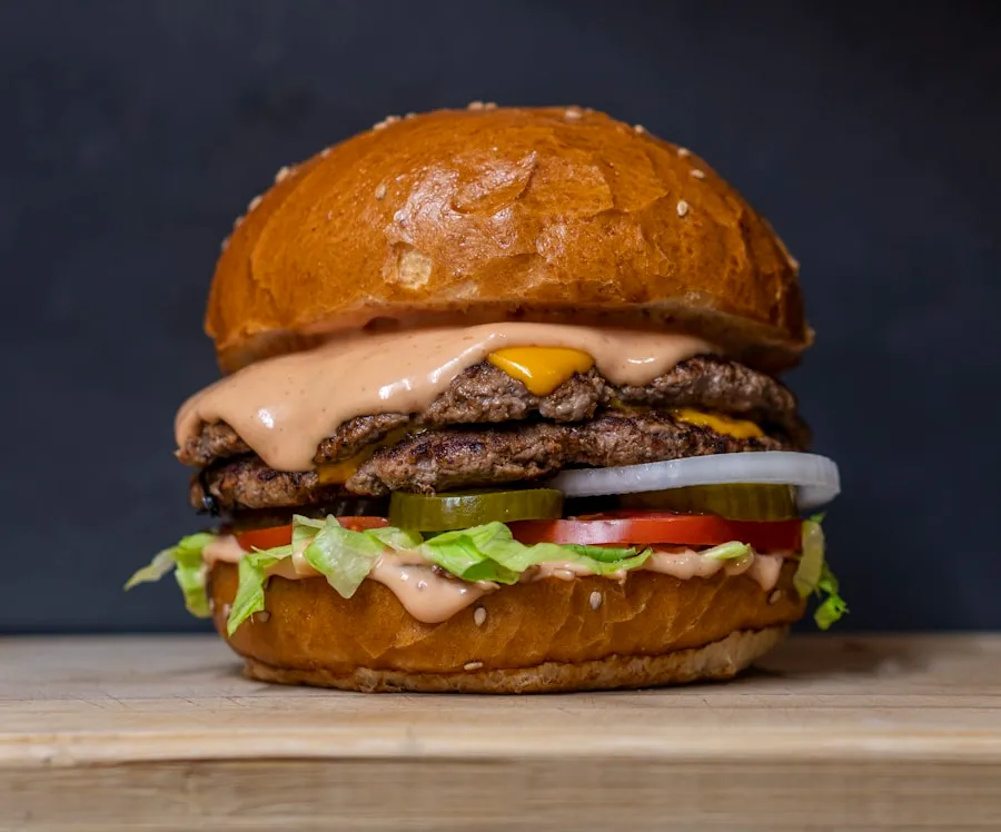 A perfectly smashed burger with melted cheese and caramelized onions