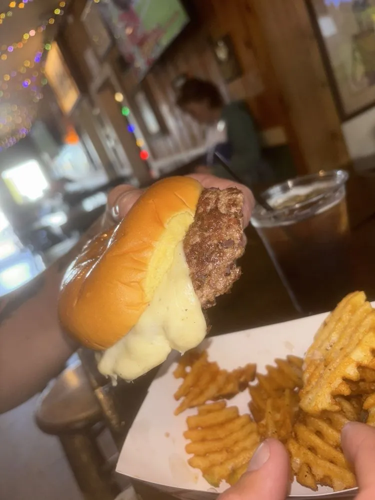 Dalton's cheeseburger and seasoned waffle fries at RiNo Country Club