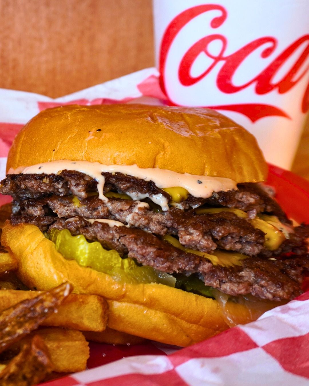 Baddies Burger House burger close-up in Athens, GA