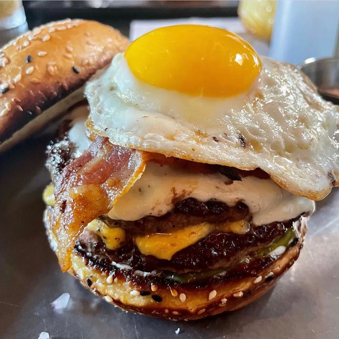 Close-up of Gretel Griddle Burger showing caramelized edges and creamy garlic aioli