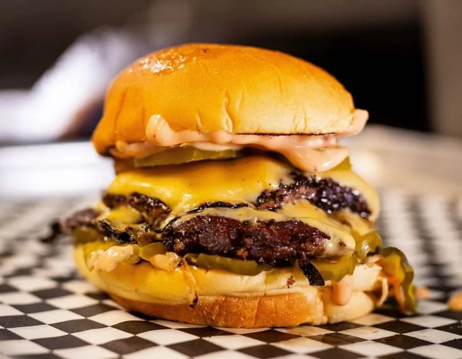 NADC Burger wagyu smash burger and fries in Chicago