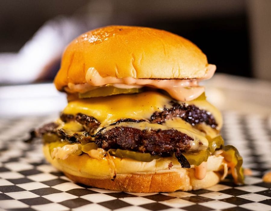 NADC Burger wagyu smash burger and fries in Chicago