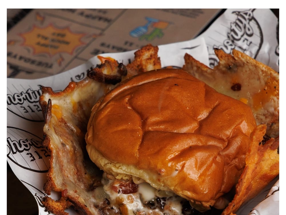 Shorty's cheese skirt smashburger close-up at Desert Hawk Wicker Park