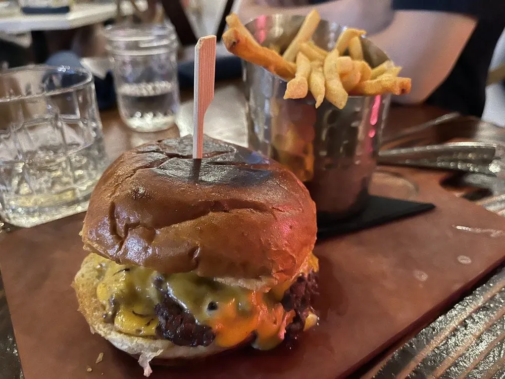The Hampton Social double cheeseburger served with french fries