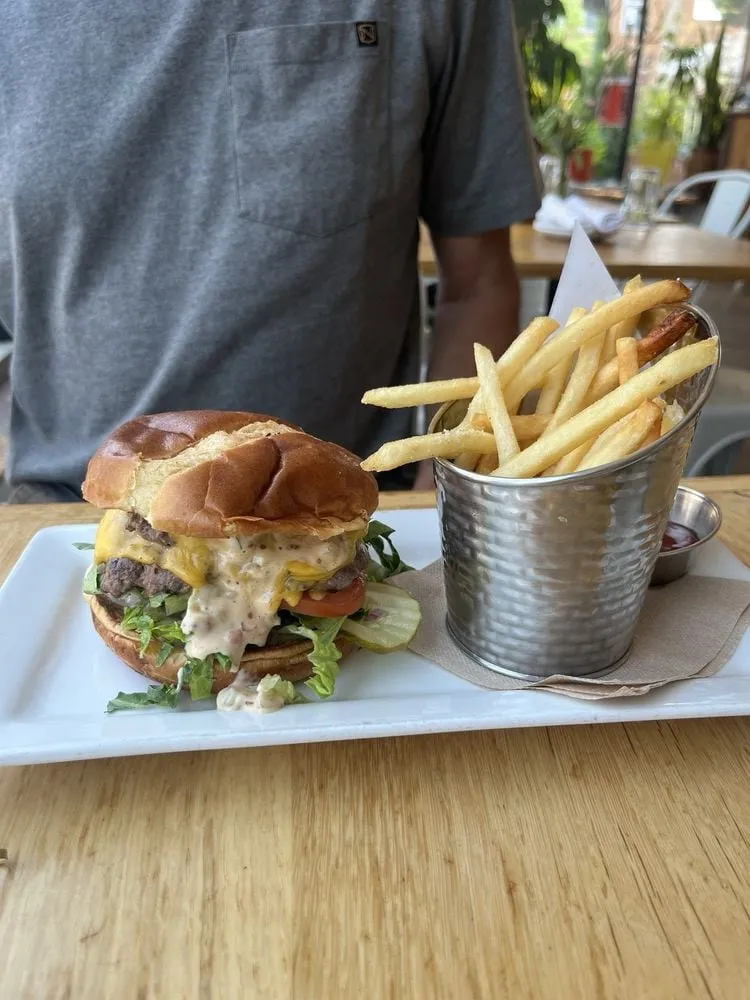 Uncommon Ground burger served with fries in Chicago