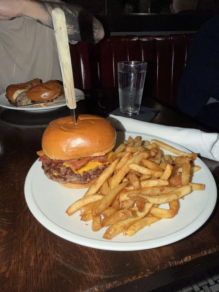 Pullman Bar & Diner smashburger with cheese, pickles, and fries
