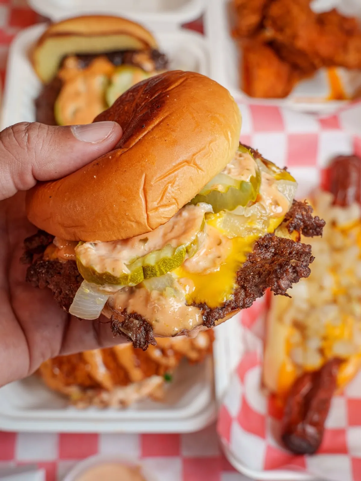 Dipped N' Smashed burger spread with fries and chicken