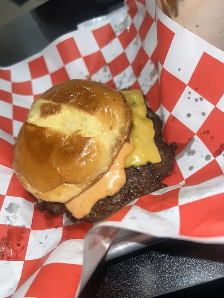 Bun's n Shakes original smashburger with cheese and house sauce