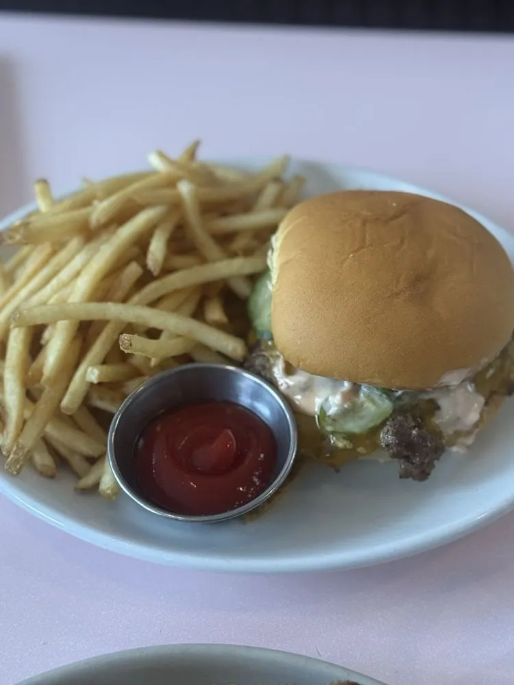 Cafe Roze Smashburger - mustard-grilled grass-fed patties with cheddar, house pickles, and special sauce
