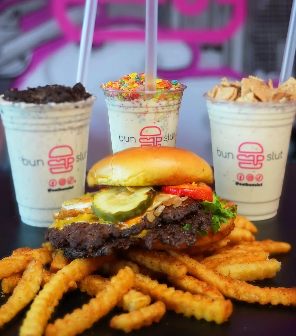 BunSlut burger, fries, and three milkshakes