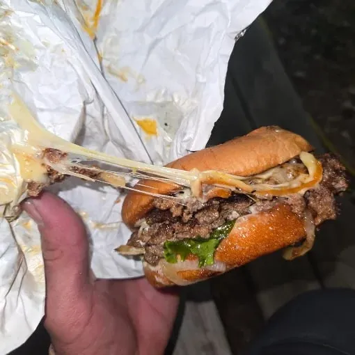 Texan Buns burger cheese pull