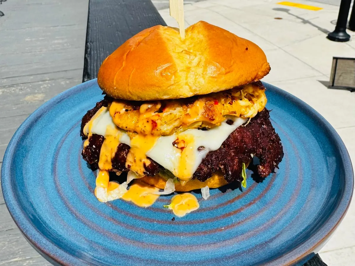 Game Over smash burger and arcade bar food in West Bend